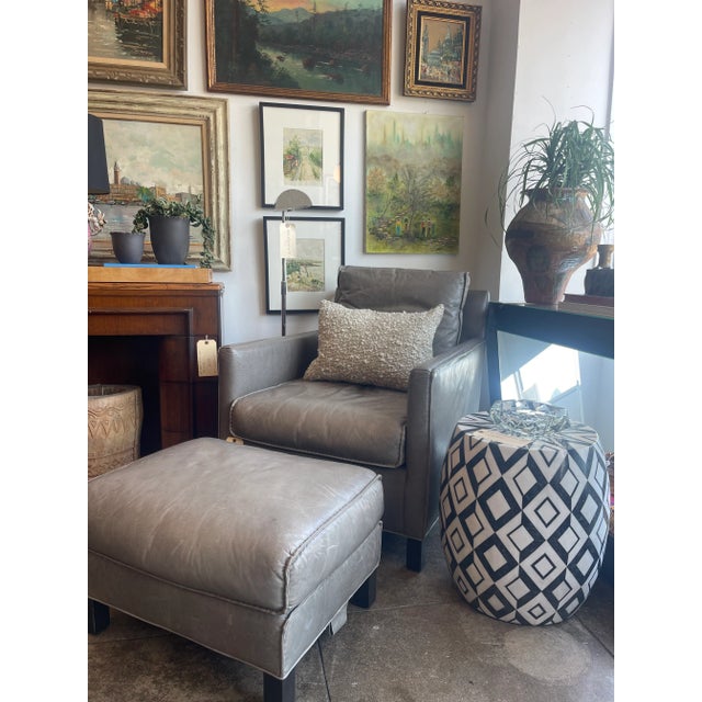 Room and Board Bram Leather Chair and Ottoman. Upholstered in Pesaro Putty, an Italian top grain performance leather with...