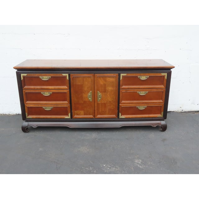 This magnificent Sideboard is made of wood, solid wood, veneer, and metal. The Sideboard was made by a fine furniture...