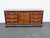 This magnificent Sideboard is made of wood, solid wood, veneer, and metal. The Sideboard was made by a fine furniture...