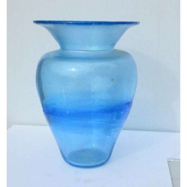 Sky Blue art glass wide-mouth vase. A classic shape and wide flaring mouth with the stretch glass most obvious around the...