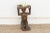 A masterpiece of African art, this antique Luba stool showcases a stunningly carved woman holding up the seat. The wax-...
