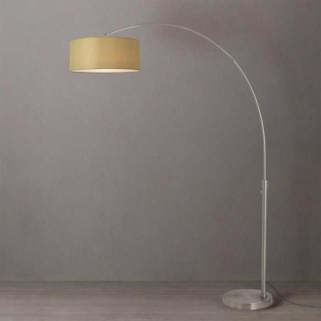 The Float Arc Lamp is a Modern arc lamp with a satin nickel steel frame, designed by Peter Morelli in 1960. This iconic...
