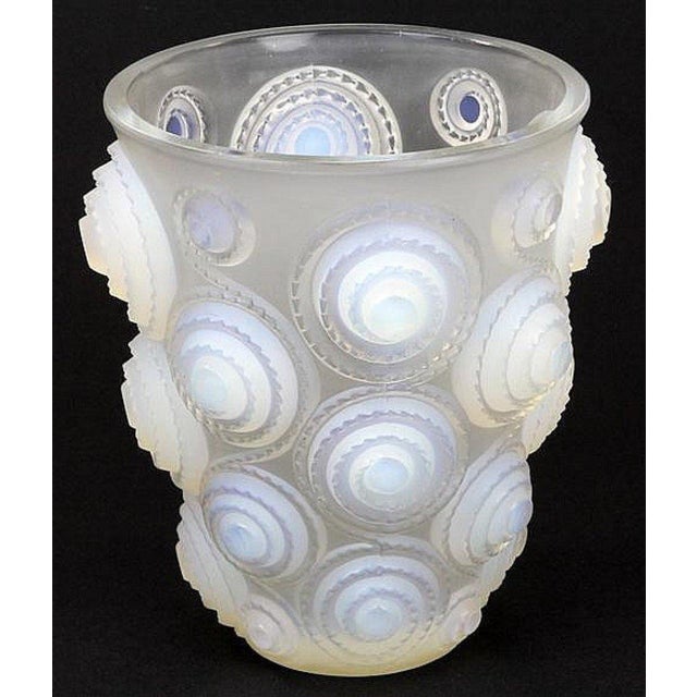 Opalescent pressed molded glass vase created by René Lalique in 1930. Signature with sandblasted cover. Excellent...
