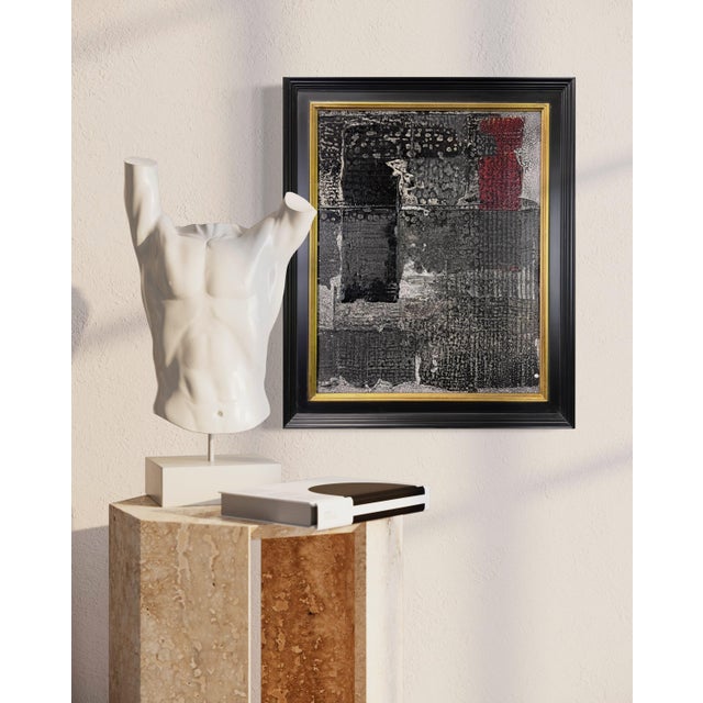 In Gesture No. 1 by J. Kent Martin, a horizontal tension unfolds across a dense field of black, gray, and punctuated red,...