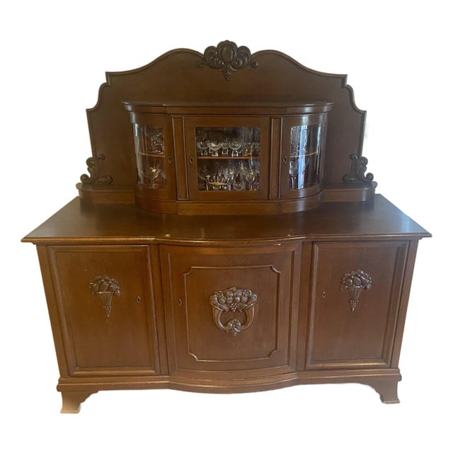 Black Forest Style Large Exquesite Carved Oak European Buffet/Sideboard With Unique Curved Glass Display Mid 20th Century For Sale
