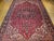"This vintage Persian Heriz rug, woven in the renowned weaving region of Azerbaijan in Northwest Persia, features a...