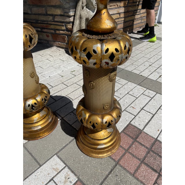 Pair of plaster and metal gold leafed 35” inches tall lantern lamps they take 2 small lightbulb each please see photos for...