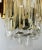 Pair of luxurious 1970s ice shaped crystal wall lights with golden polished brass fittings. Made by the German company,...
