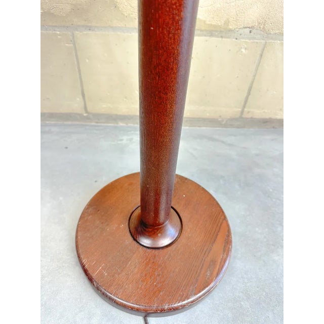 Beautiful mid - Century design. 1970s floor lamp made by German Temde Leuchten. Wooden column with 4 glass bulbs with...
