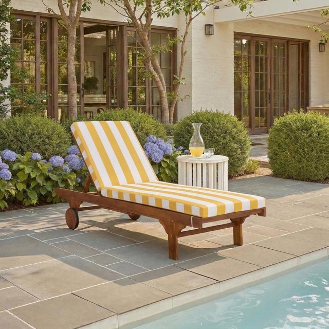 Transform your outdoor space with the Newport Lounge Chair in Yellow Stripe. This stunning chair combines the natural...