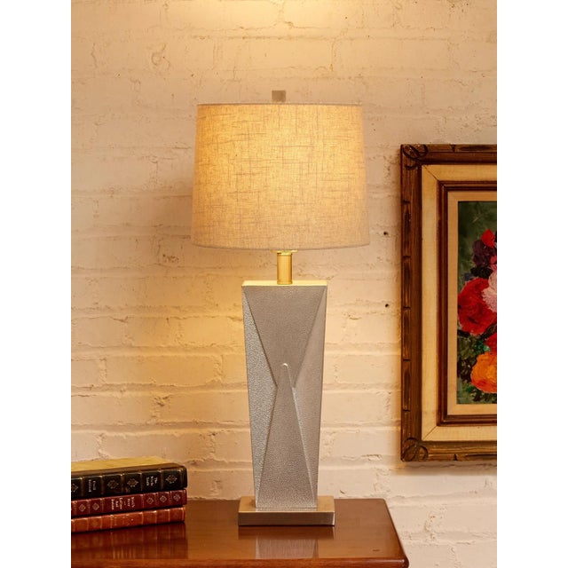 This stunning piece will add a touch of sophistication to any room in your home. The lamp will provide a warm and cozy...