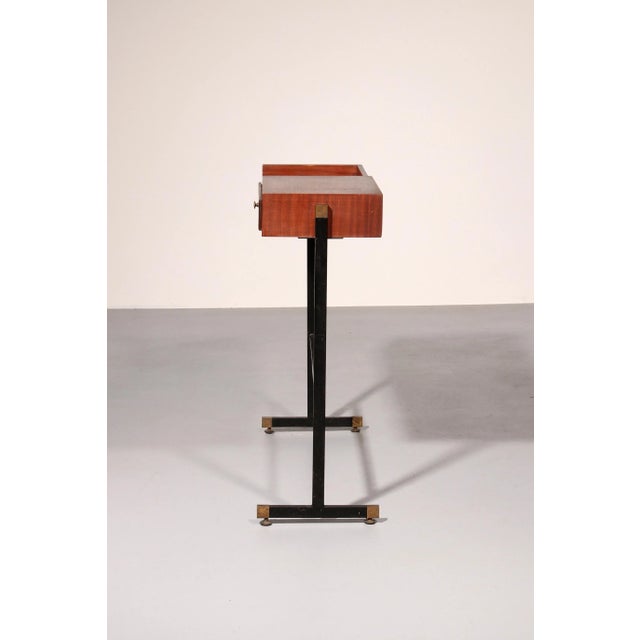 Discover a true gem of Italian design with this rare mid-century modern console, crafted in Italy around 1960. This piece...