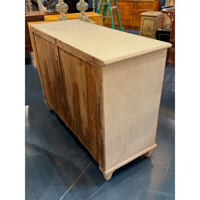 Late 19th century Swedish Gustavian carved and painted buffet cabinet. Gustavian buffets are prized for their neoclassical...