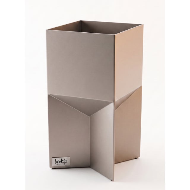 The Mike Ratledge vase is the first piece in a sculptural series that merges high-fashion architecture with the...