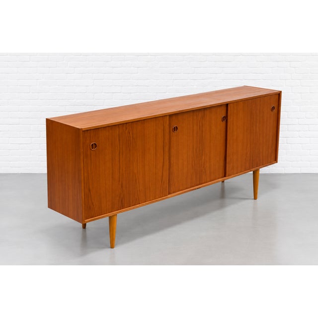 Wood Long Mid Century Modern Teak Credenza | Danish Sliding Door Sideboard, C. 1960's For Sale - Image 7 of 13