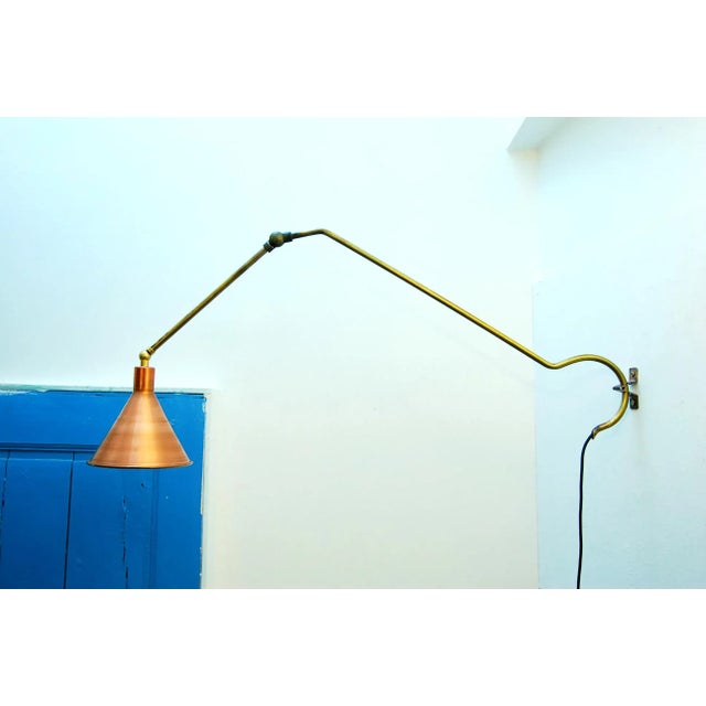 Inspired by Faries wall lamps in the early 20th century, this sconce has 4 points of articulation. The gravity between the...