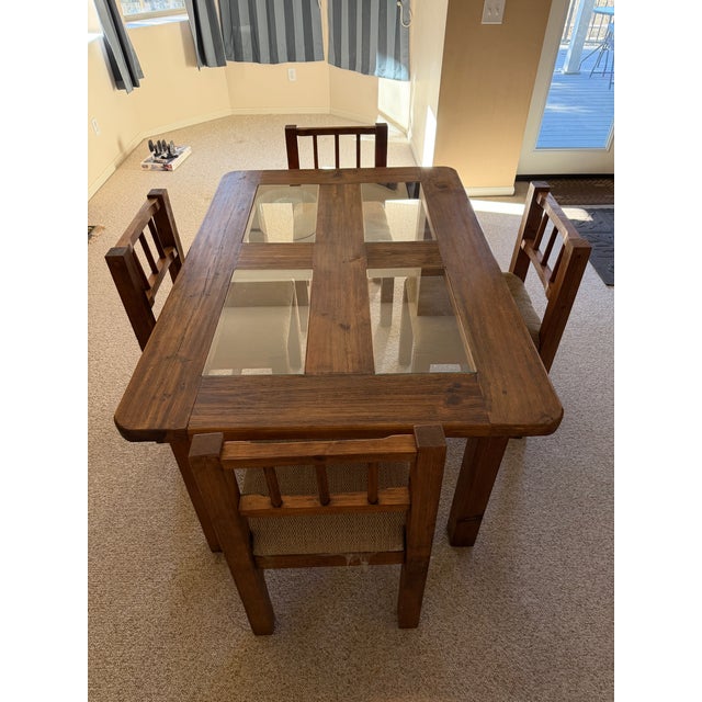 Classic rustic dining set hand made in Mexico in late 1990s. Solid wood with glass inserts. imported from Mexico in mid...
