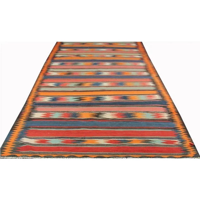 This beautiful Vintage Geometric Swedish Style Flatweave area rug features a delightful geometric tribal design. Currently...