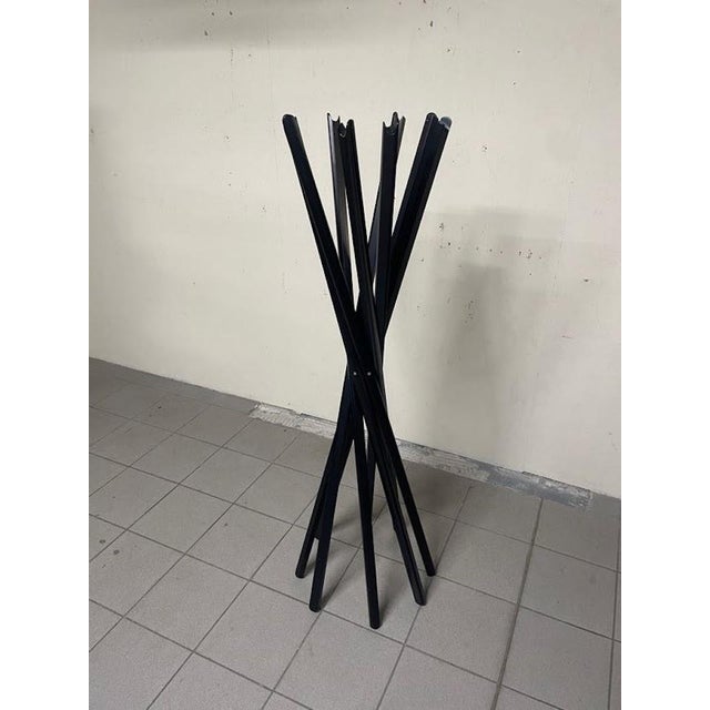 The iconic Sciangai coat rack, designed by the design trio Gionathan de Pas, Donato D’Urbino, and Paolo Lomazzi in 1973...