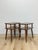 This fun and characterful pair of vintage MCM atomic two-tier end tables are a playful and practical mid-century modern...