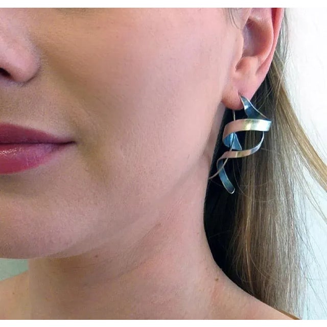 Silver Swirls, American Modernist Silver Earrings, Gerhard Herbst Studio. These Modernist earrings were part of the...