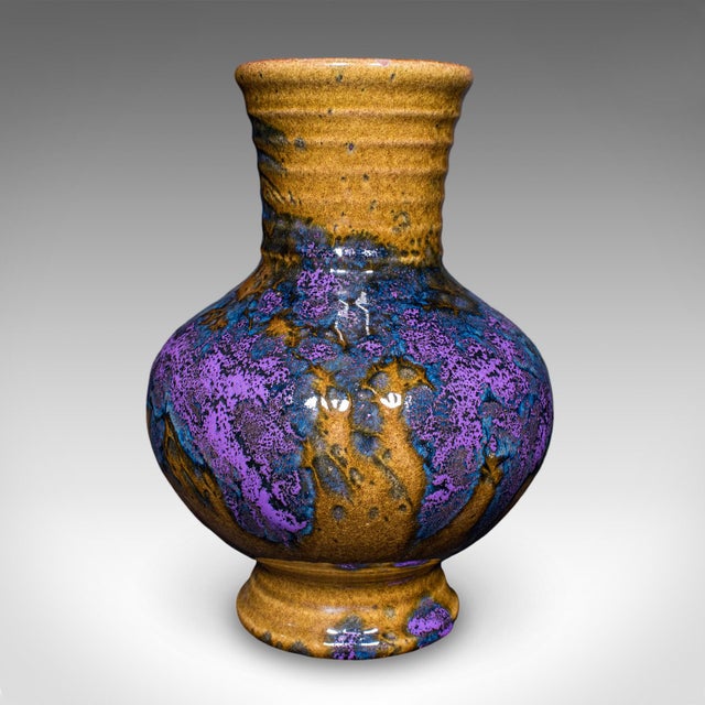 This is a vintage fat lava posy vase. A German, glazed ceramic flower pot, dating to the late 20th century, circa 1970....