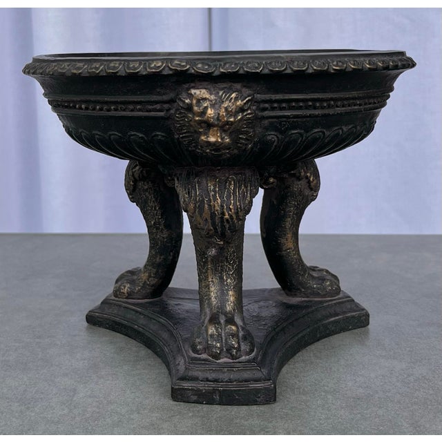 Vintage decorative neoclassical pedestal bowl/tazza/stand. Dark finish with brass-like effects, highlighting the intricate...