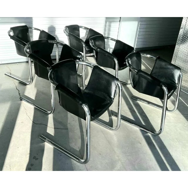 Featured is a Postmodern set of 6 Vecta Group Zermatt Tubular Sling Chairs. Designed by Duncan Burke and Gunter Eberle for...