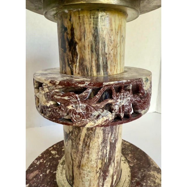 This vintage Asian Chinese carved marble candle holder features a bold, altar-style form with an intricately carved...