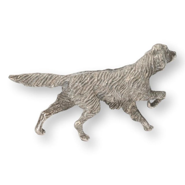 Charming vintage silver plated figure of an English setter, dating to the 1920s and made in England. The piece is cast in...