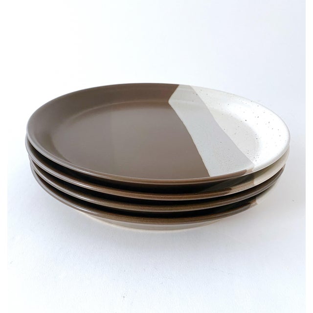 Here is a vintage Mikasa “Potters Art” dinner plate set. These gorgeous mid-century pottery plates were designed by Ben...
