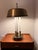 Bring a touch of timeless French refinement to your desk or console table with this exceptional mid-century Bouillotte-...