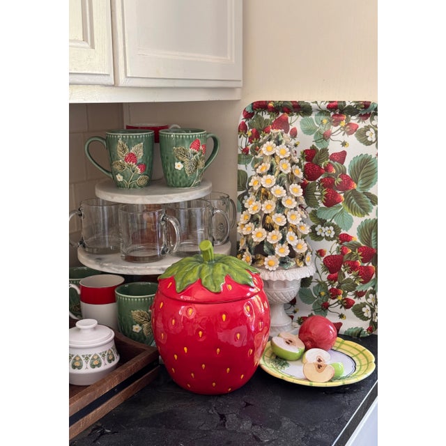 Suitable as a decorative three dimensional plate, here is a vintage Trompe L'Oleil fruit still life featuring green and...