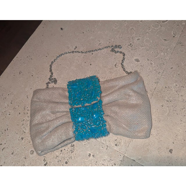 Beaded clutches from Banana Republic, the turquoise and shimmery burlap is perfect for a summer night out!