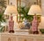 Beautiful pair of vintage 1960s Chinese-style porcelain table lamps featuring elegant hand-painted red cherry blossom...