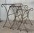 Original 1950s outdoor/patio nesting side table pair with iron scrolling base. Stylish set of three stacking tables having...