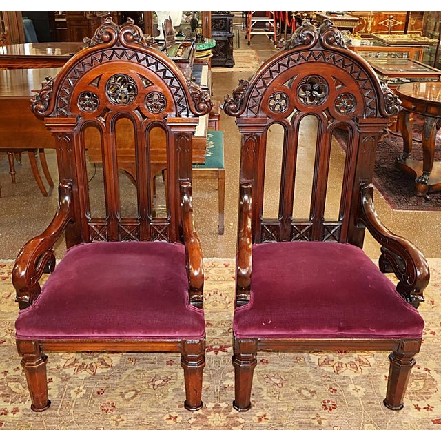 ​Pair of 19th Century American Gothic Mahogany Arm Chairs Dimensions : 55" Tall X 27" Wide X 25" Deep This gorgeous pair...