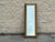 Tall vintage mirror with an ornate molded gilt frame featuring openwork scrolls, lattice details and foliate motifs. Its...