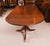 This is a fabulous Vintage Regency Revival triple pedestal dining table dating from the mid 20th Century. The table is...