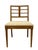 This vintage Mid-Century Modern dining chair features a clean and elegant design typical of mid-20th-century...