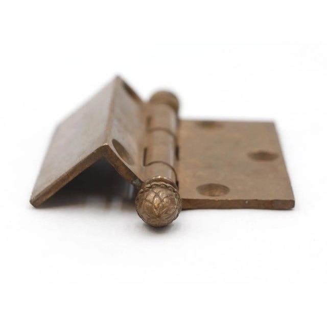 This single plate offset door hinge is made of bronze with acorn tips, five knuckles, and a template hole pattern. The...