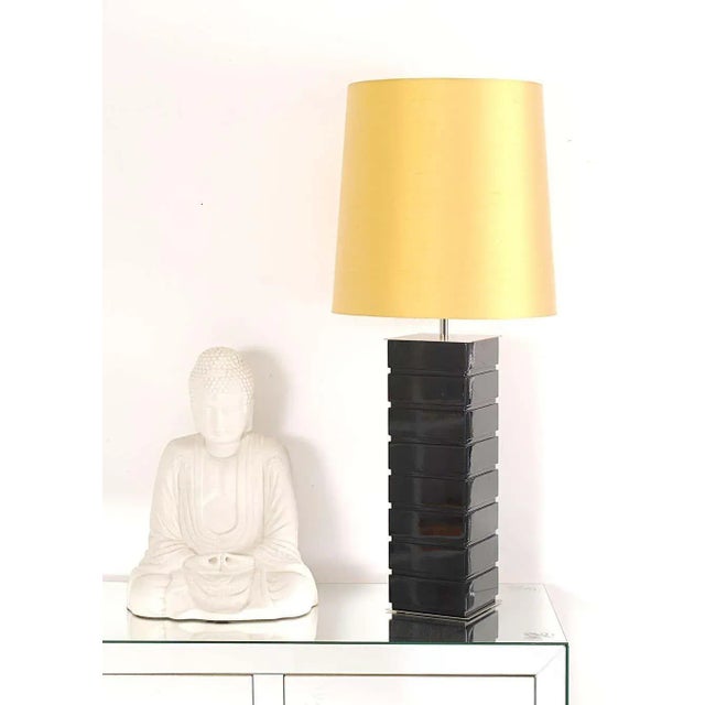 Table lamp Lacquered wood, The lampshade is available in either fabric or silk in yellow, midnight blue or pure white....