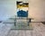 Vintage Modern Glass Motion Table | Rotating Swivel Glass Side Table | Mid Century Modern Accent Furniture This striking...