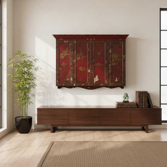 A striking oxblood red Chinoiserie wall cabinet by Maitland‑Smith, this piece blends sculptural presence with exquisite...