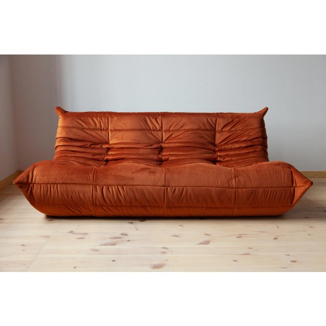 This Togo has been reupholstered with new foam and high-quality new fabric, keeping its inner structure, giving the item...
