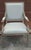 A French-style Louis XVI armchair , Upholstered with thick Aqua Linen and Carved Rustic Gray Oak Wood. Upholstery in...