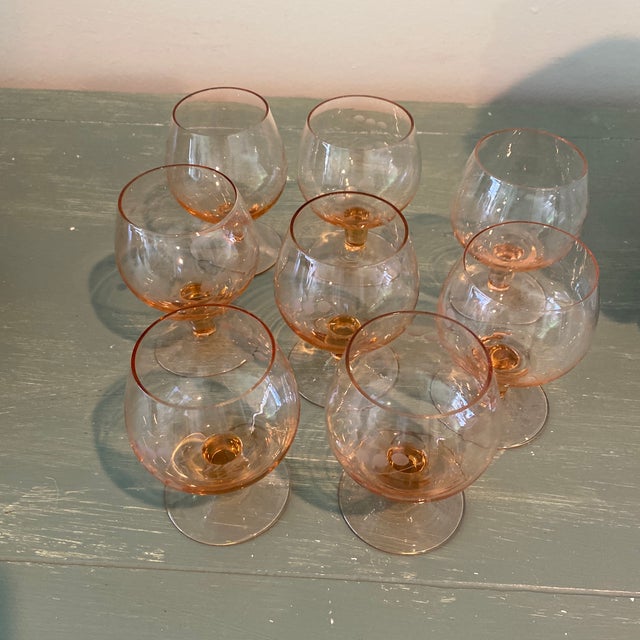 These sweetly footed glasses are both stylish and functional. Subtle etched design is lovely.