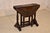 Early 18th century hand-carved oak gate leg table. This extraordinary piece is a one of a kind work of art. The artistry...
