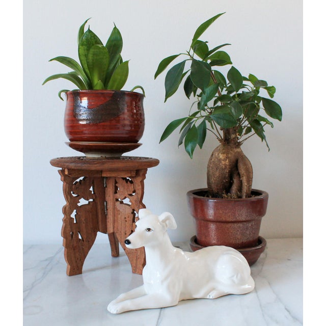 Vintage Anglo Indian carved wood plant stand. Made in India. Minor age wear.