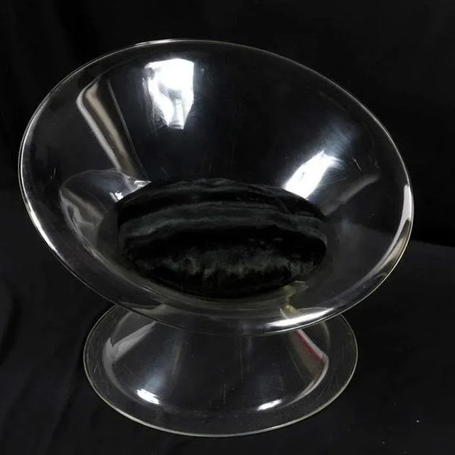 A "Buttercup" lucite lounge chair by Erwin & Estelle Laverne, designed for Laverne International as part of the Invisible...